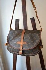 Louis Vuitton sac à main modèle Saumur en toile et cuir