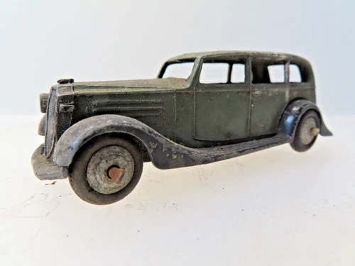Vintage DINKY Early VAUXHALL SALOON in fair condition ..*