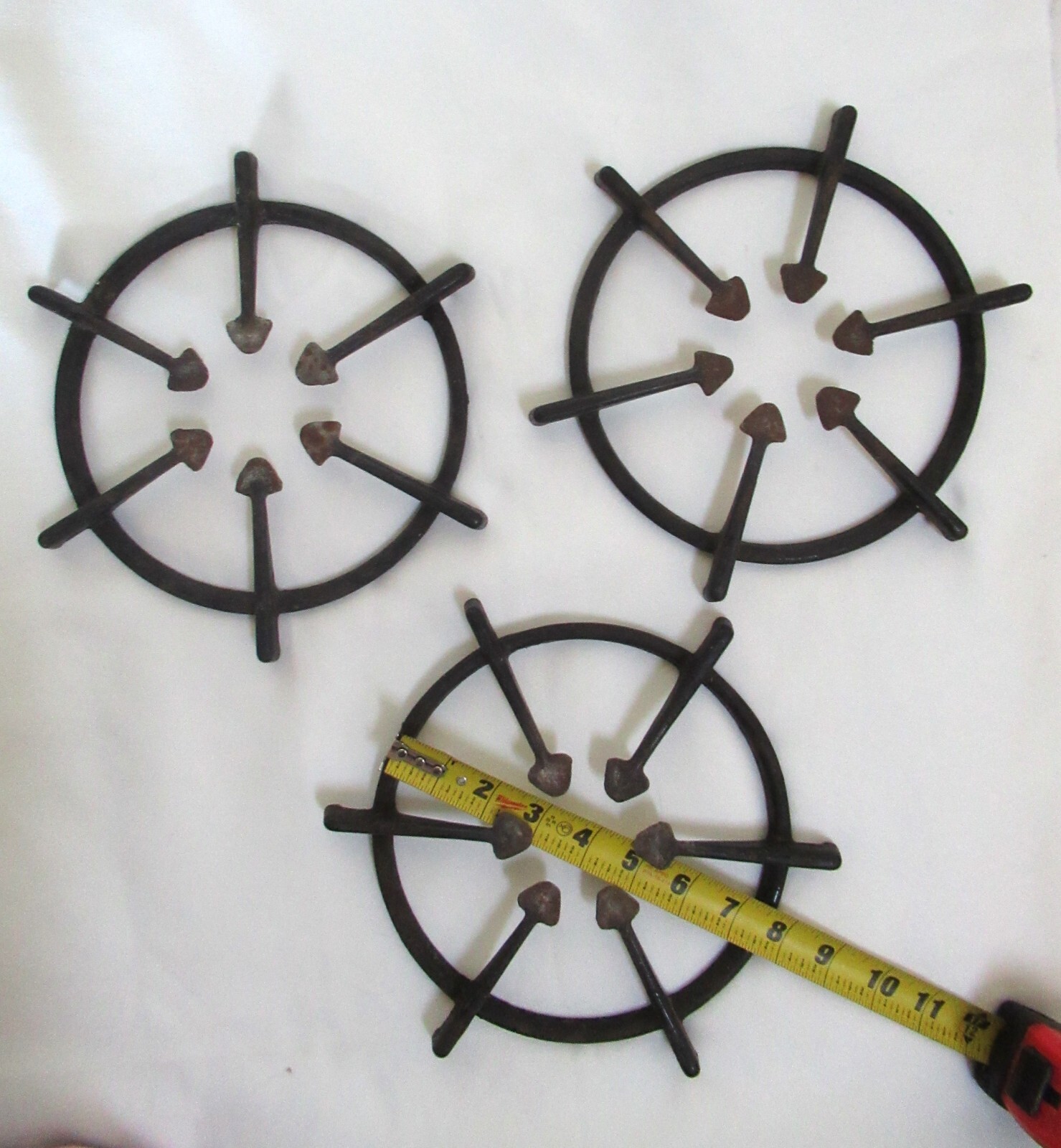 Set of 3 vintage UNMARKED Round Cast Iron Stove Burner Grates trailer?