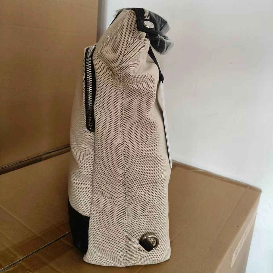 Maletín y mochila Knomo Harewoord para mujer para 16 portátiles, lona con cuero Foto 2 de 4