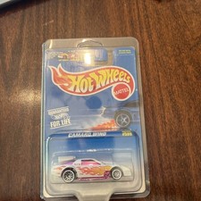 Camaro Wind #599 1996 Hot Wheels coleccionista nuevo en paquete envío gratuito blanco/rosa