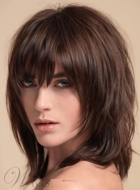 Image of Medium-long layered shag with blunt bangs