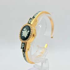 Andre Mouche Oval Bangle Watch White Dial Quartz Women's Swiss Made 21mm In hand
