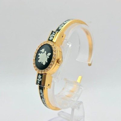Andre Mouche Oval Bangle Watch White Dial Quartz Women's Swiss Made 21mm In hand