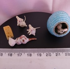 Miniature set of two mice, a cat & a piece of cheese. Plus mouse in nest.