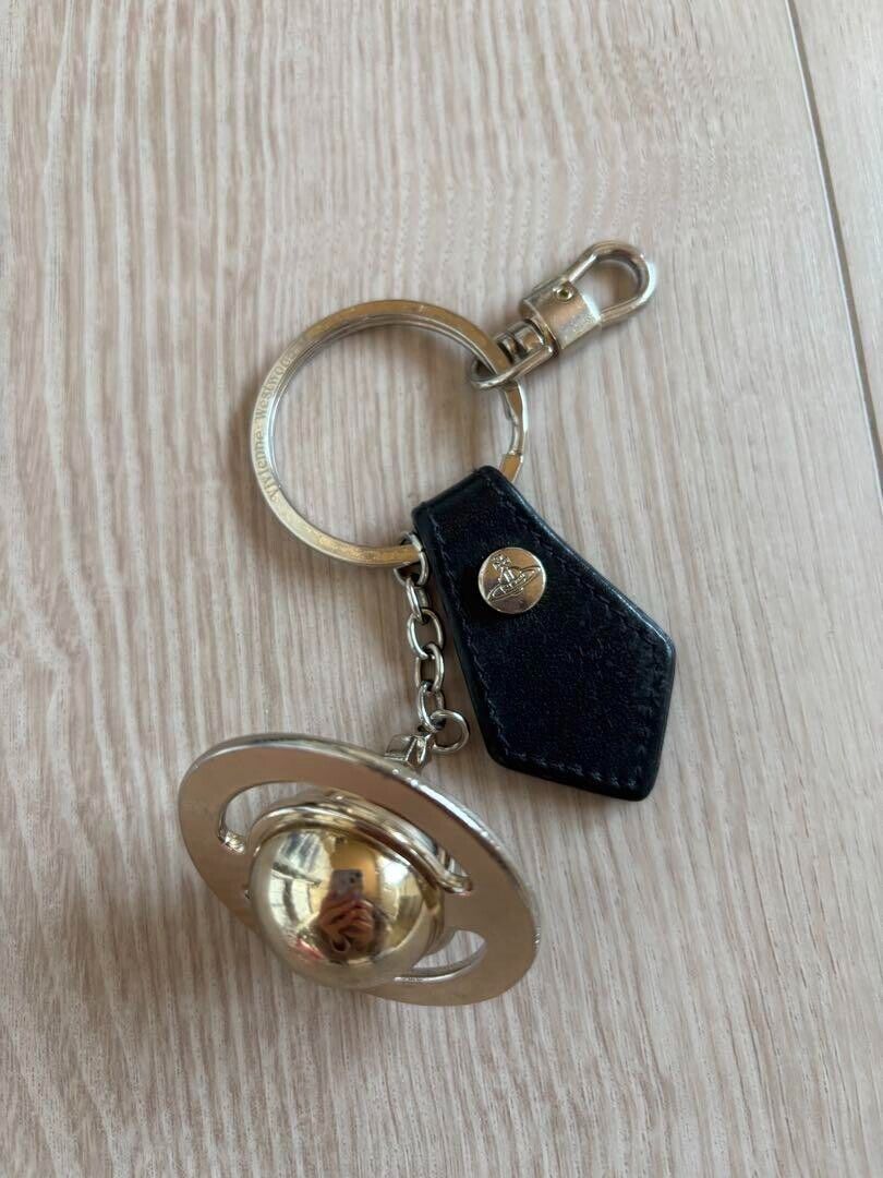 Vivienne Westwood Keyring DEBBIE 3D ORB Bag Charm Black Gold Vivienne Westwood Keyring DEBBIE 3D ORB Bag Charm Black Gold