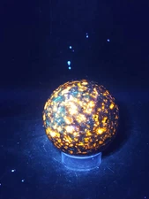 Flame stone sphere "yooperlite" 58mm, 2.2 inches, 9.6 ounces!
