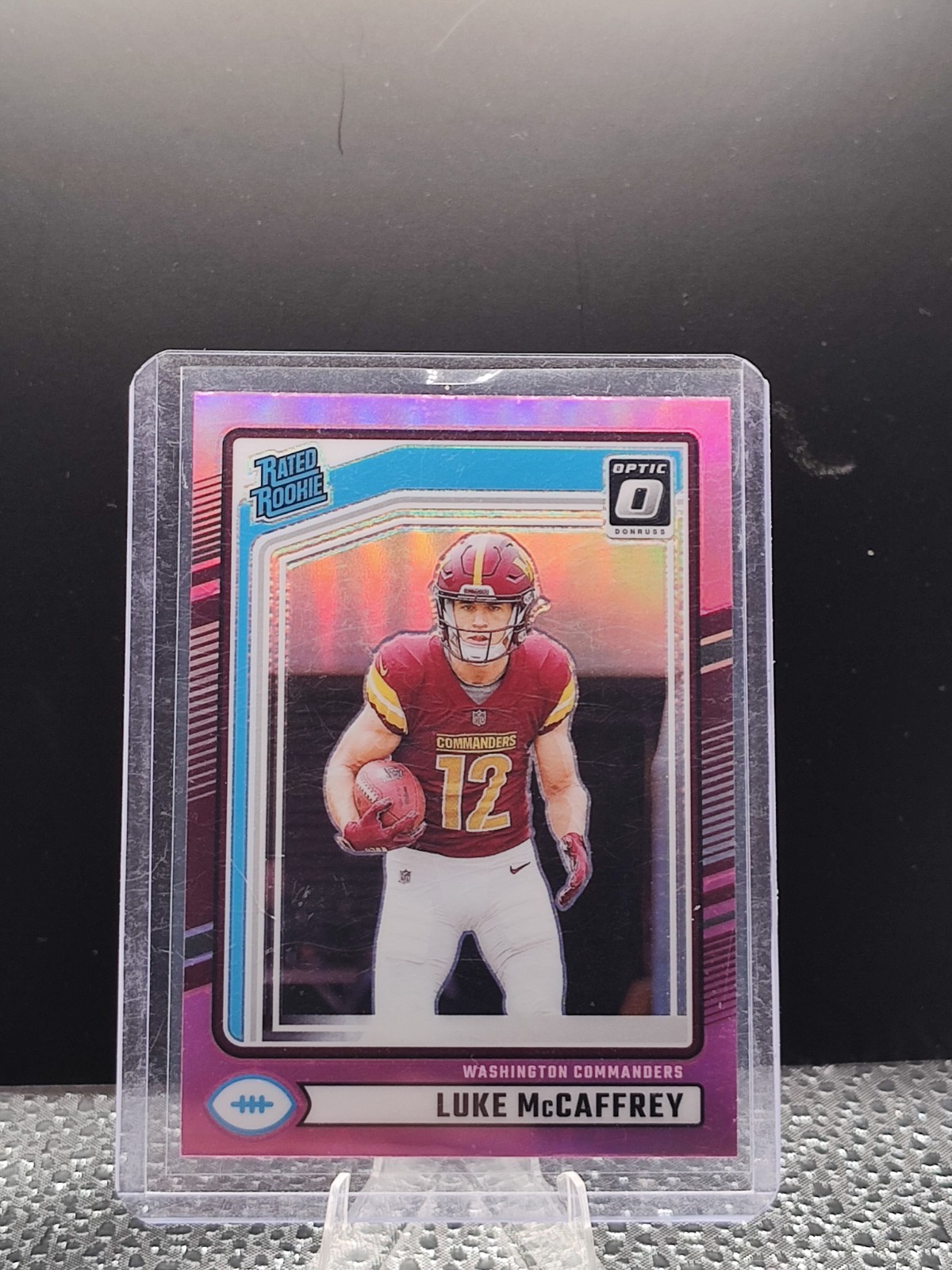2024 Panini Donruss Optic - Rated Rookie Luke McCaffrey #268 Pink Prizm (RC)