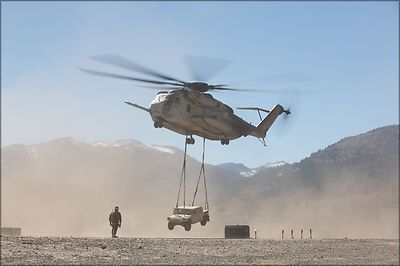 Poster, Many Sizes; Ch-53E Super Stallion Helicopter Transports Humvee