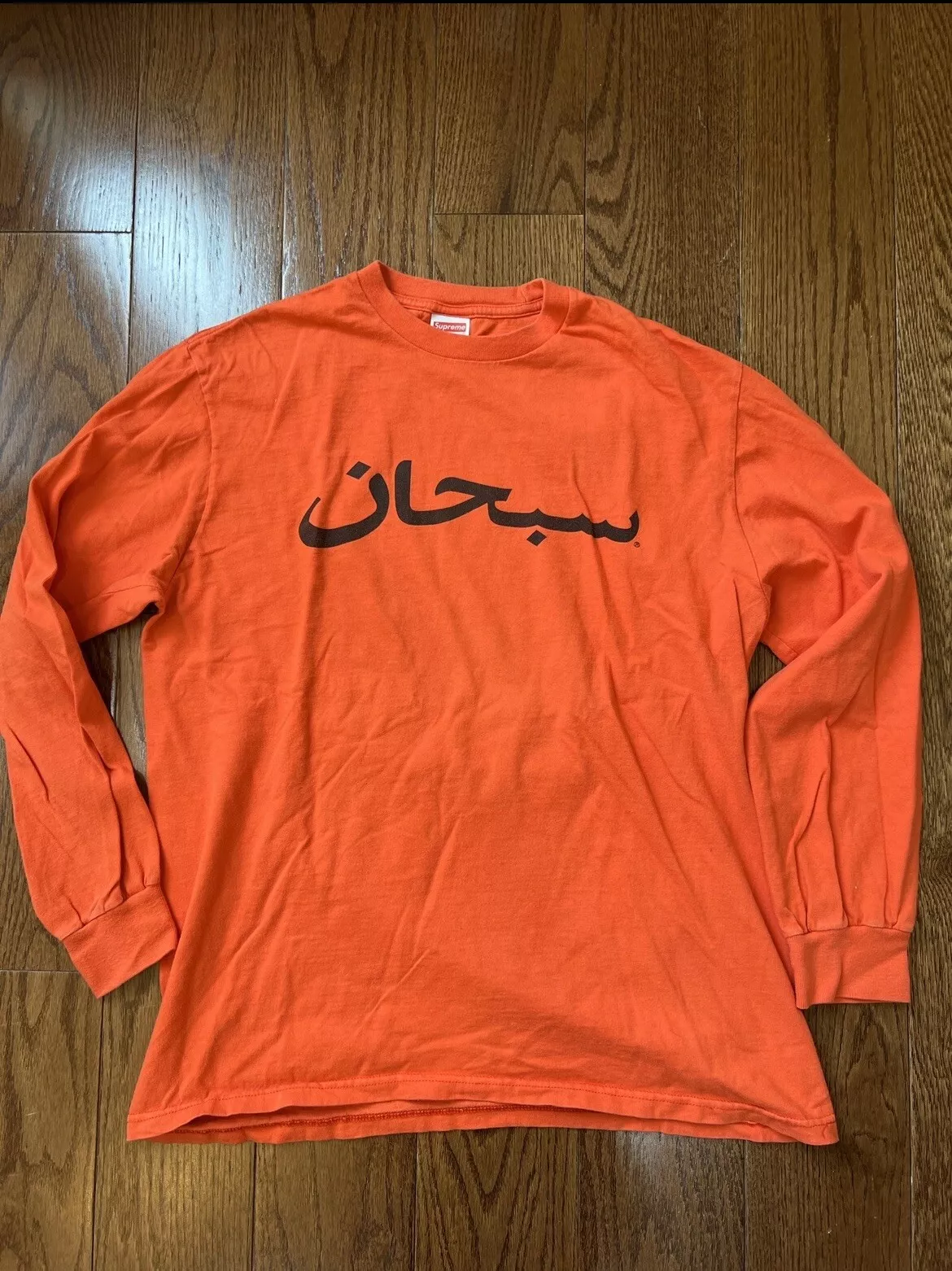T shirt orange à manches longues logo arabe suprême taille M