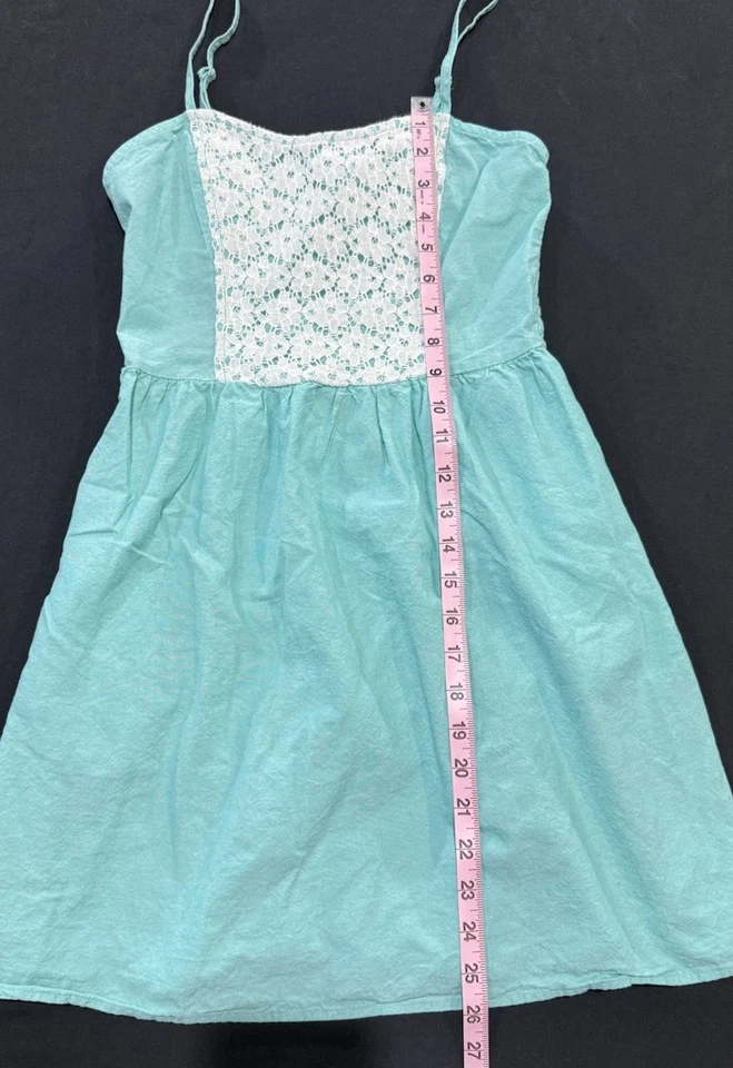 Mini Vestido Mimi Chica Azul Teal Blanco Detalle Ojales Bolsillos Talla Pequeña Foto 2 de 4