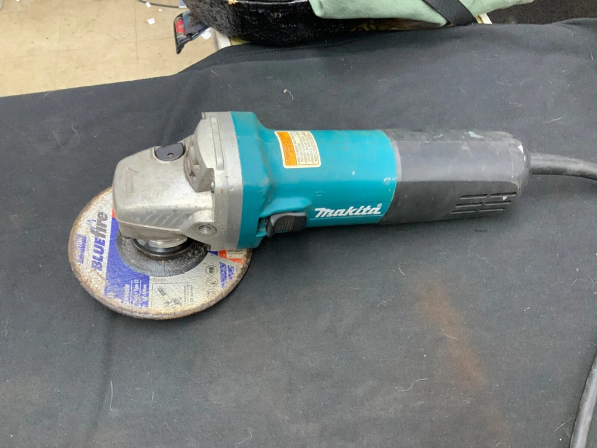 Makita angle grinder 9557nb deals