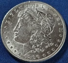 A 1896 MORGAN SILVER DOLLAR HIGH GRADE
