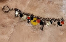 Alice in wonderland Charm Bracelet. Roses. drinks. key. clock Charm Bracelet