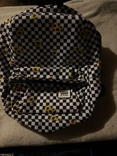 Black and whit Vans backpack