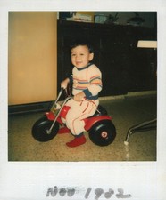 Old Vintage Photo COLOR POLAROID SOLO BOY RIDING TOY TRICYCLE INSTANT PHOTOGRAPH
