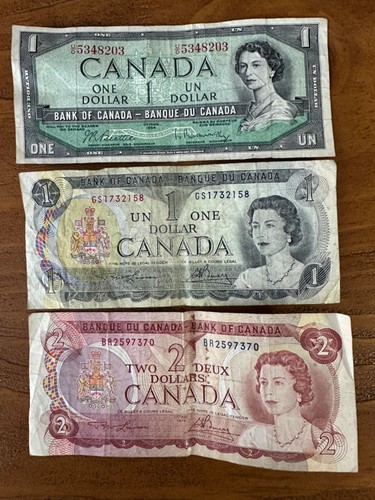 1954 Canada Queen Elizabeth $1 Note; 1973 Bank of Canada $1 Note; 1974 $2 Note