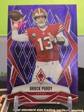 2025 Panini Phoenix #33 Brock Purdy Purple Winter Prizm #/249