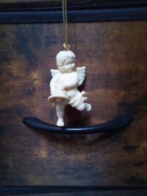 Churub Angel Holding a Bear