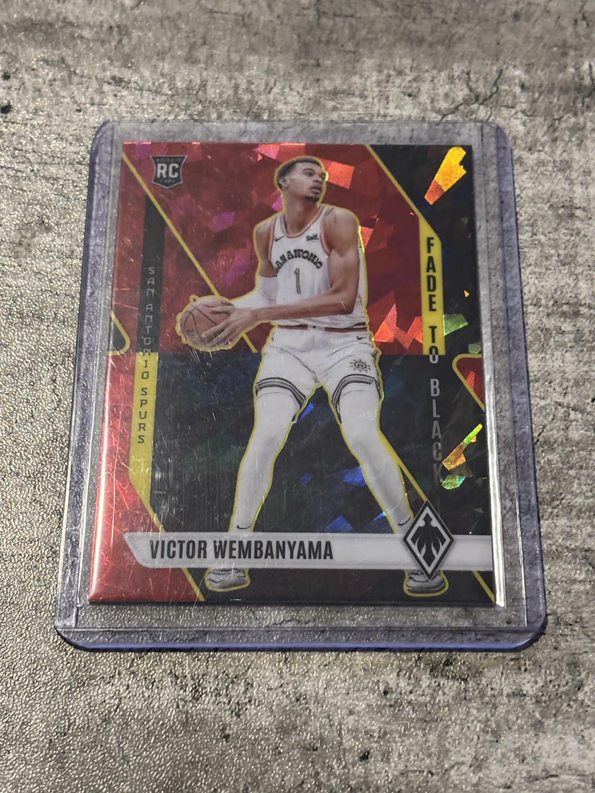 2023-24 Panini Phoenix - Fade to Black Victor Wembanyama #11 Red Ice (RC)