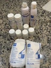 Lot Of 13 Medical Supplies = Saline Wound Wash, Sterile Water, Gauge Bandages