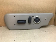 03-06 SILVERADO YUKON FRONT LEFT DRIVER SEAT SWITCH BEZEL NEUTRAL TAN 521 522