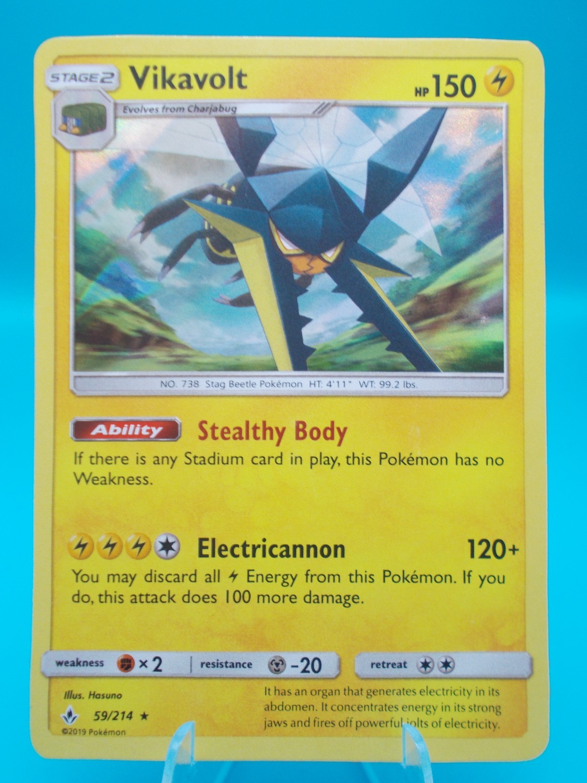 Vikavolt 59/214 Sm-Unbroken Bonds Pokémon TCG Holo Near Mint/Mint