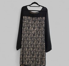 black long-sleeved dress with a beige and black lace overlay 22