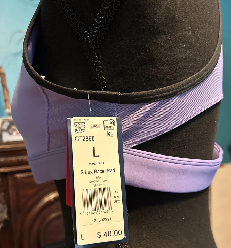 Sujetador deportivo Reebok Lux Racer para mujer talla Lg. Hyper Purple Studio Estudio Foto 4 de 4