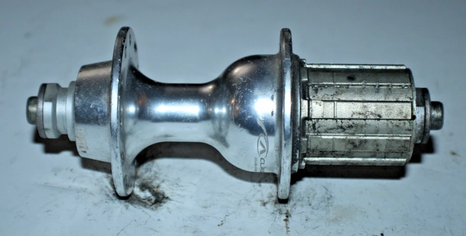 Buje trasero de carreras buje libre plateado 24H 131 mm Touring Road MTB grava remitente de EE. UU. :) Foto 3 de 4