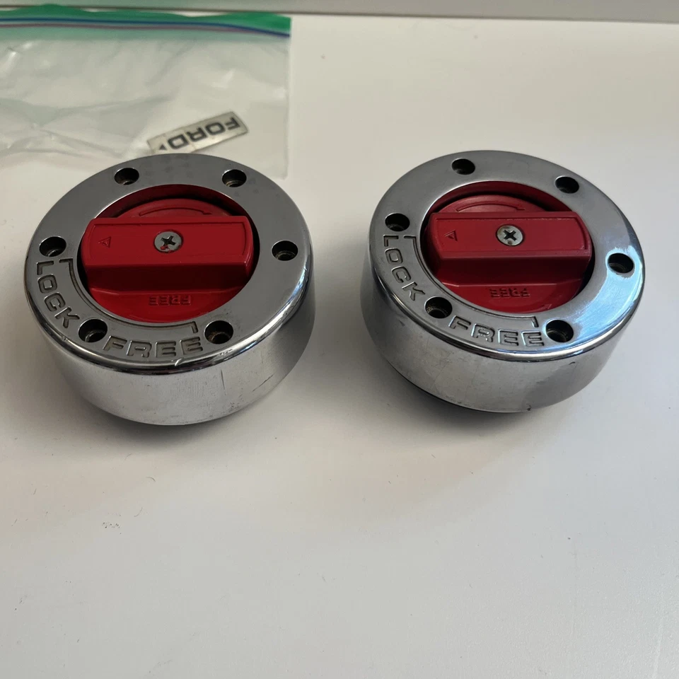 Par de tapas de bloqueo de buje delantero Ford/Warn Bronco Pickup 4X4 de la década de 1990 OEM F5TZ-1K104-B Foto 3 de 4