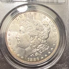 1886 $1 Morgan Silver Dollar Certified By PCGS MS65. A Bronze Rim Toned GEM!