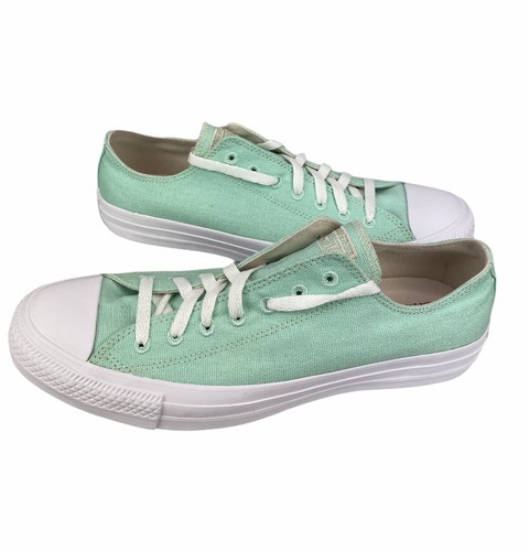 mint green leather converse
