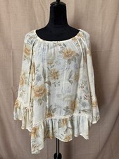 Long sleeve flowing blouse with orange gold flowers