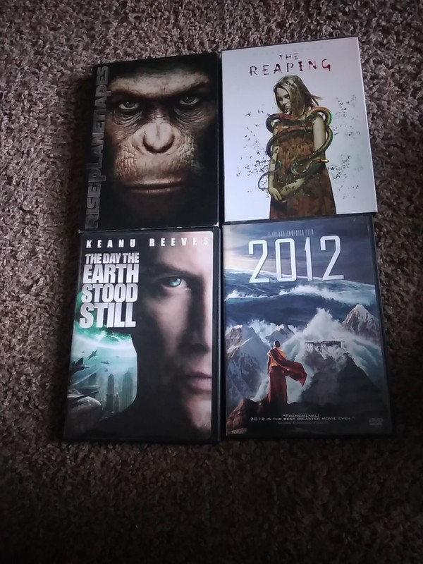 4- DVDs The Reaping. The Planet Of The Apes. The Day The Earth Stood Still.2012