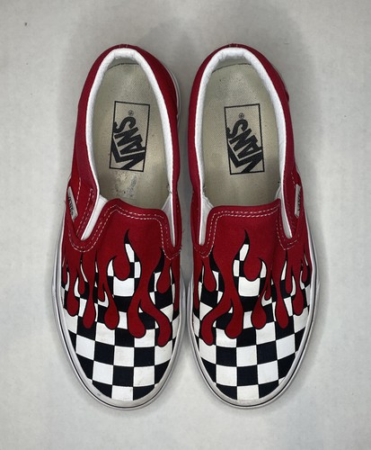 black and white checkered vans with red drip
