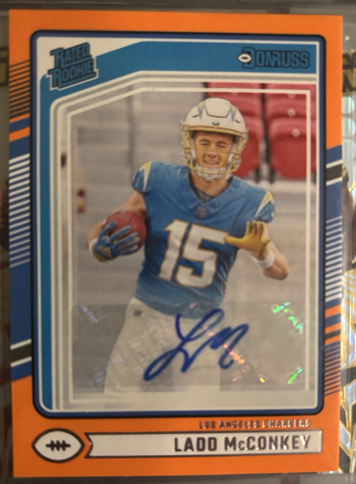 2024 Panini Donruss Rated Rookie Ladd McConkey #328 Orange Autographs (AU, RC)