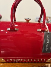 La Terre Red Vinyl Diamond Closure Handbag- Gorgeous and Spacious Interior