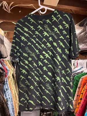 Rogue Status Rare green L