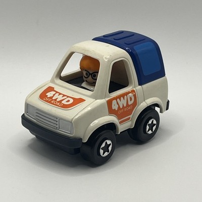1991 Tomy 4WD Off Road Truck W Driver Pull Back and Go Action Toy Car Works