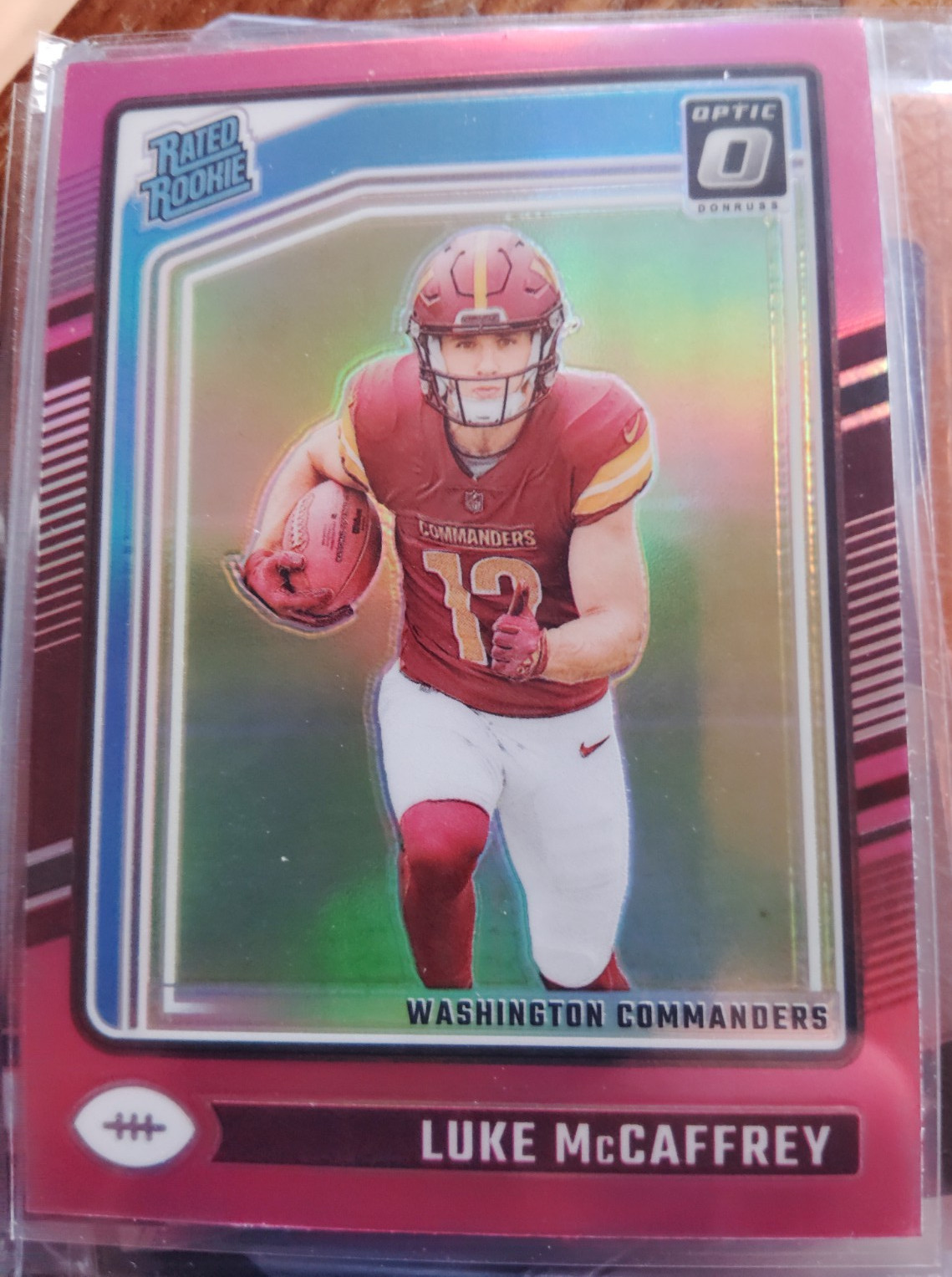 2024 Panini Donruss Optic - Rated Rookie Luke McCaffrey #268 Pink Prizm (RC)
