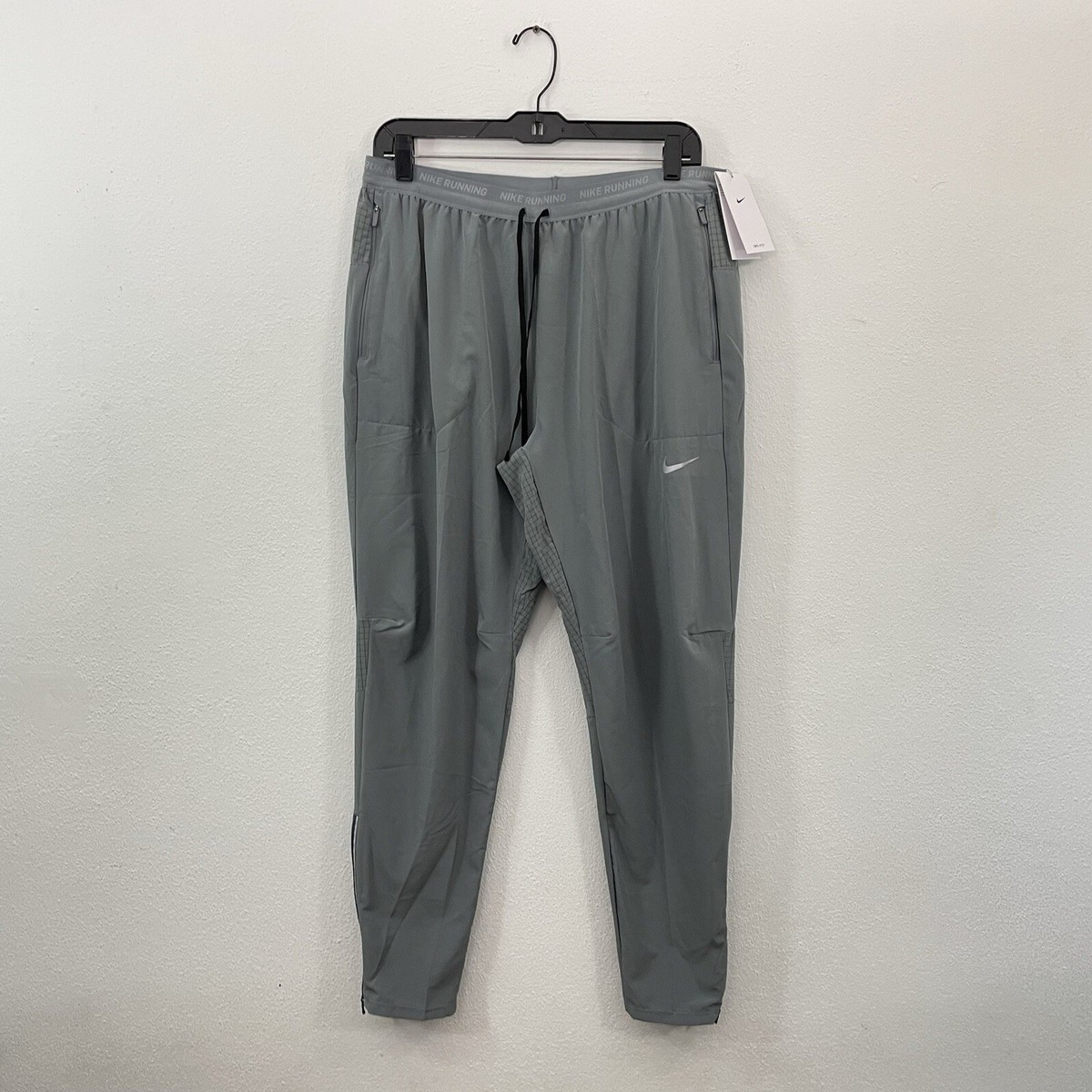 nike dri fit essential woven pocket running pants