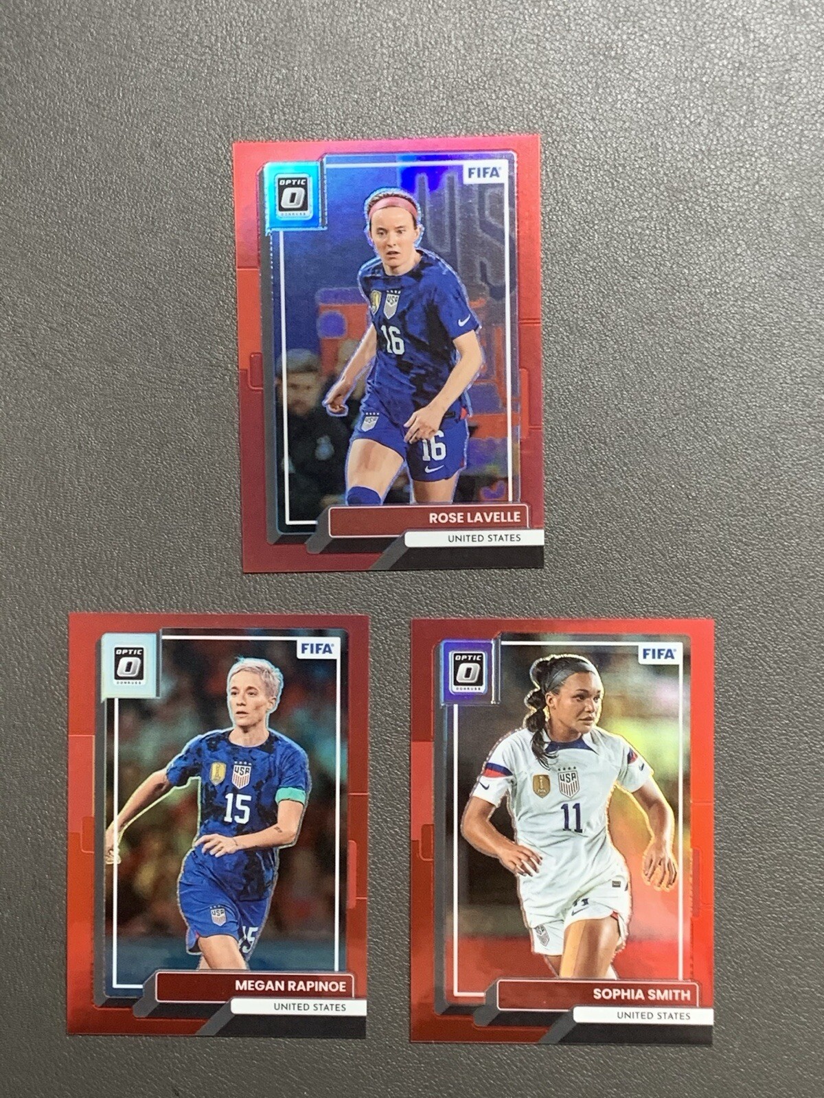 2022 Donruss Optic MEGAN RAPINOE SMITH LAVELLE Red Prizm /165 USMNT!