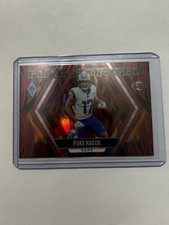 PUKA NACUA 2023 PHOENIX FOOTBALL FIRE FORGED /199 RED PRIZM RAMS B