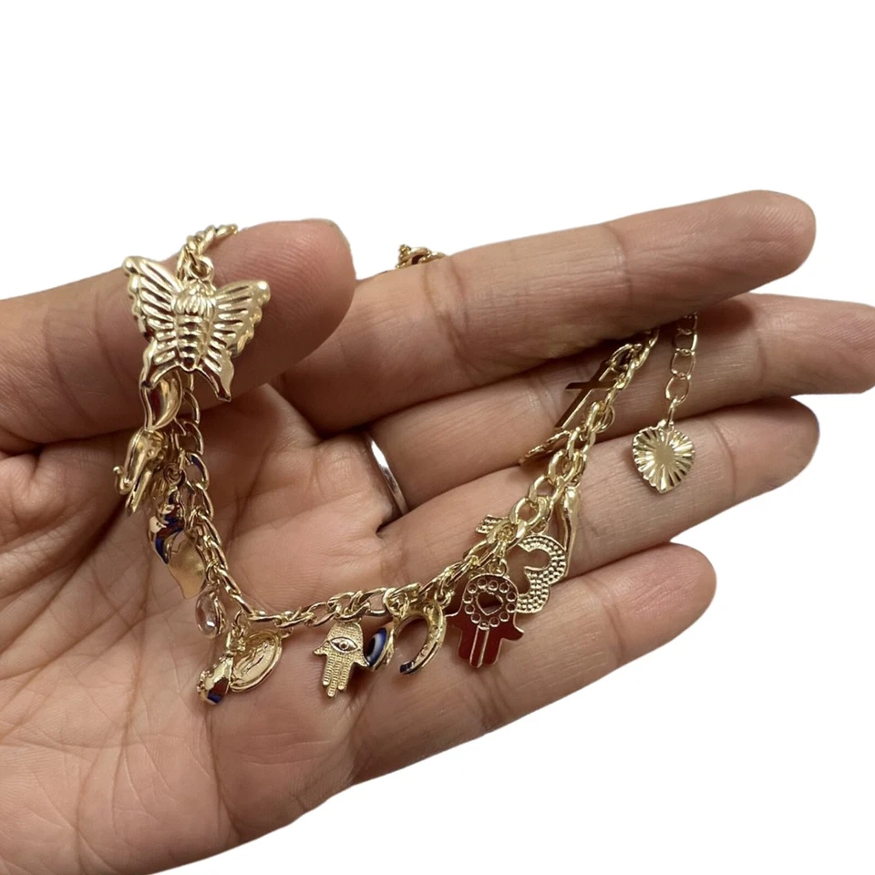 Pulseras con dije, amuletos de la suerte de oro de 14 quilates, 13, trébol, mariposa, cuerno italiano, dinero Foto 2 de 4