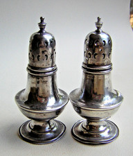 Matching pair of antique Victorian sterling silver pepperettes cruet