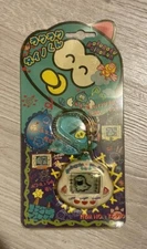 Dinkie Dino Electronic Virtual Pet RakuRaku Dinokun White From Japan