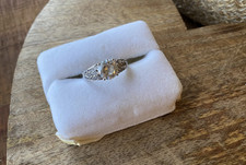 Round-cut Center Stone Ring Surrounded by Accent Stones Size 7 Cubic Zirconia