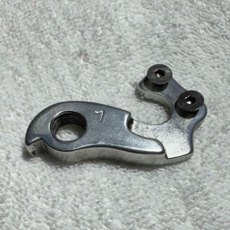 New - Kona # 7 (Wheels mfg #61 cx reference) Derailleur Hanger w/ Bolts