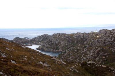 Photo 6x4 Rona coast with lighthouse in distance Rubha Chu00f9il-tairbh  c2008